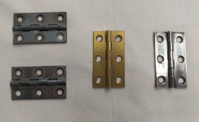 Original and replacement hinges.