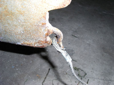 Old damaged cable, thimble and swage - causing jamming in the slot.