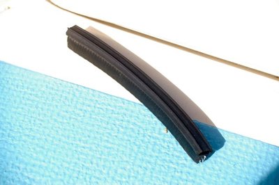 Close-up of the edge trim strip, which pinches tight onto the fibreglass hatch edge without the need for glue.